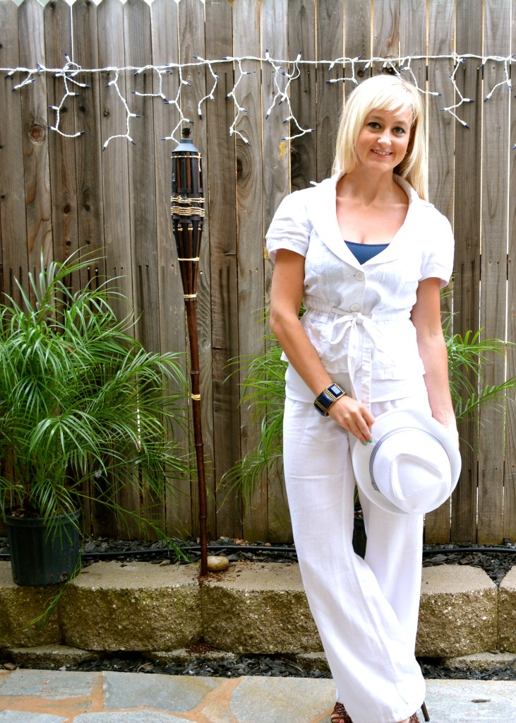 Accessorize with a fedora, strappy standals and navy jewelry!