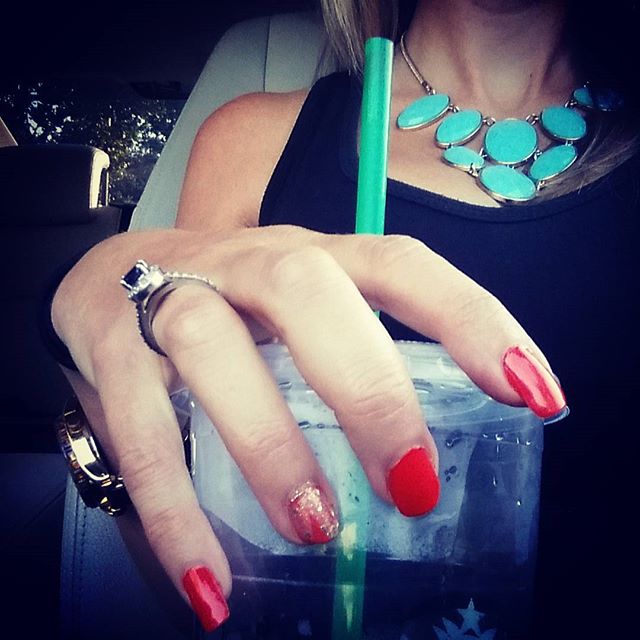 #mynailsandmydrink in orange and gold and a casualty